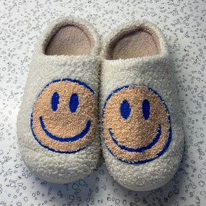 Smiley face slippers.